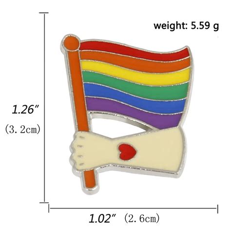 Holding Rainbow Flag Lapel Pin Mist LGBTQ Foundation