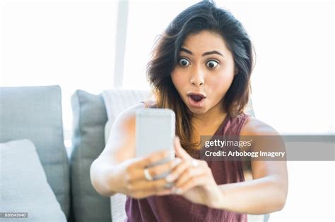 Fun Young Woman Taking Selfies High Res Stock Photo Getty Images