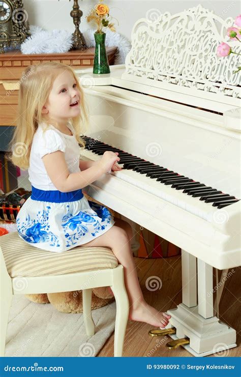 Little Girl Is Playing The Piano Stock Photo Image Of Play Interior