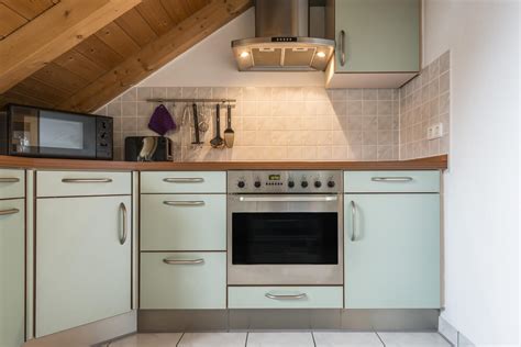 An attic kitchen becomes a small resort, here we enjoy warmth in the winter and experience a soothing acoustics. 43 Small Kitchen Design Ideas (Some Are Incredibly Tiny)