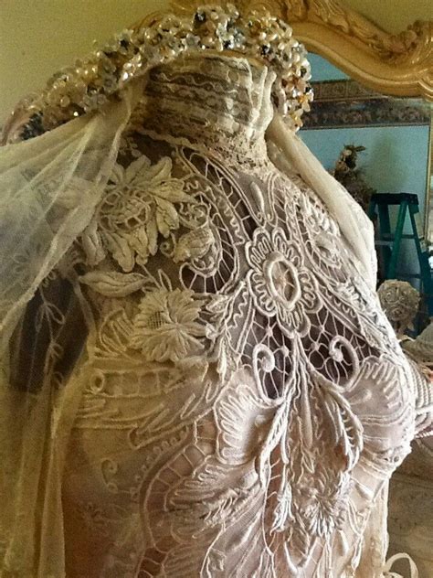 antique lace bodice of wedding dress and veil on a dress form linens and lace beautiful