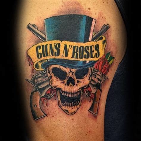 Gun tattoo designs are opted for by people due to various reasons. 40 Guns And Roses Tattoo Designs For Men - Hard Rock Band ...