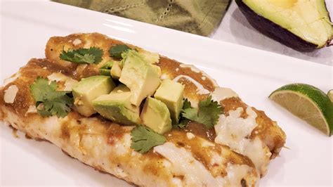These vegetarian enchiladas are stuffed with corn, beans, and cheese and topped with the most luscious roasted poblano cream sauce! Black Bean & Poblano Enchiladas - The Tasty Bits