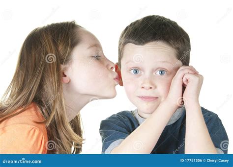 Young Girl Kissing Boy On Cheek Stock Photo Image Of Funny Cheek