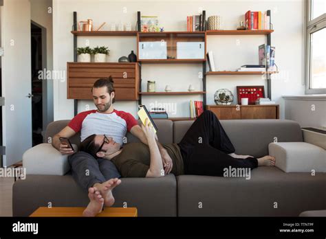 Gay Couple Relaxing Sofa Hi Res Stock Photography And Images Alamy