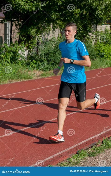 Young Athlete Running On Track Stock Photo Image Of Training Track