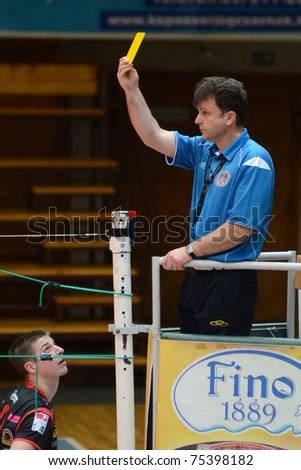 Raise both arms vertically, palms forward. Kaposvar, Hungary - April 3: Mezoffy (Referee) Presents Yellow Card At A Hungarian National ...