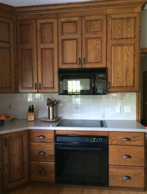 When finished, dampen a cloth with mineral spirits, wipe the entire surface of the cabinet and let dry. Kitchen Before & After! — COPPER CORNERS | Modern oak ...