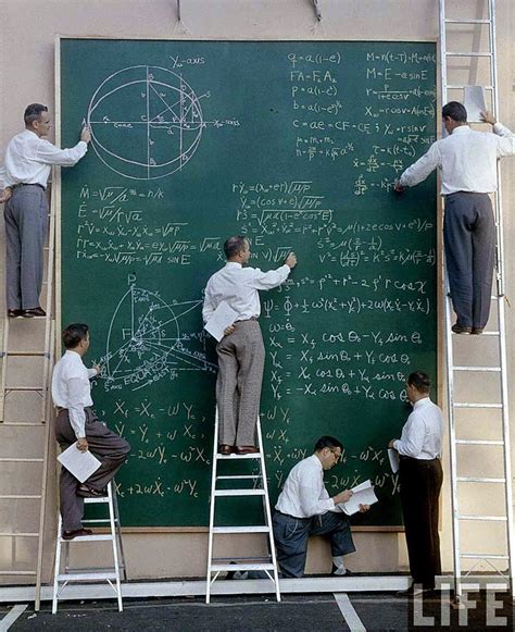 Nasa Scientists With Their Board Of Calculations 1961