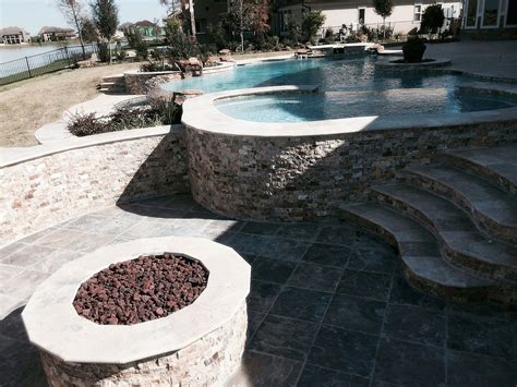 Freeform Travertine Pool With Negative Edge Mediterranean Porch