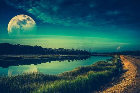 Night Sky And Super Moon At Riverside Serenity Nature Background