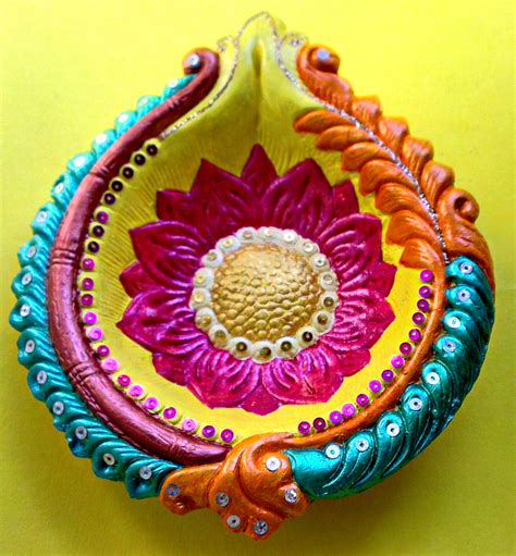 Kundan jewellery evolved from the traditional style of rajasthani and gujarati royalty. Multicolored Hand-Painted Terracotta Floral Diwali Diya ...