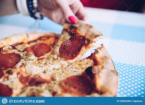 Hand Taking Pizza Slice Hot Italian Pepperoni Stock Photo Image Of