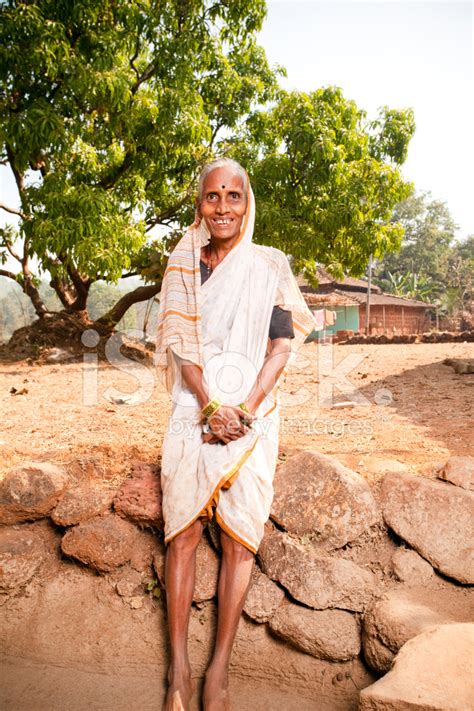 Cheerful Rural Indian Senior Woman Standing IN A Village Stock Photos
