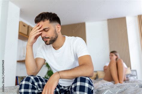 Young Sad Man Sitting On Bed After Quarrel With Wife Hotel Travel
