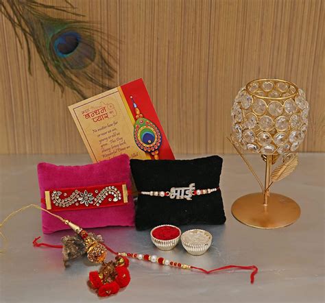 Buy Collectible India Combo Of Crystal Rose Candle Holder Dora Rakhi