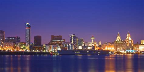 Liverpool is a city in merseyside, england on the eastern side of the mersey estuary. Liverpool At Night Looking at the ciy from the river mersey