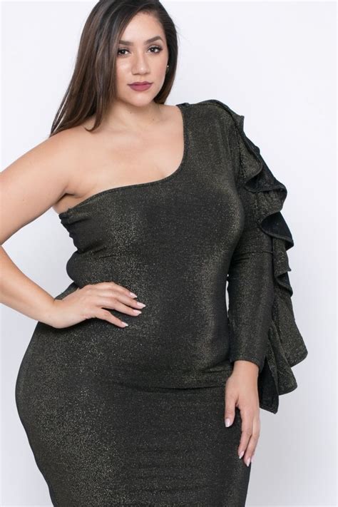 this plus size stretch knit dress features an asymmetric neckline a one shoulder with ruffle