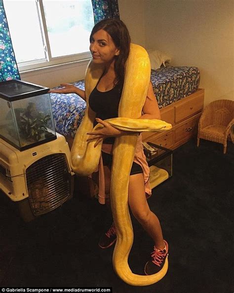 Biology Student Gabriella Scamponeposes With Snakes To Prove They Are