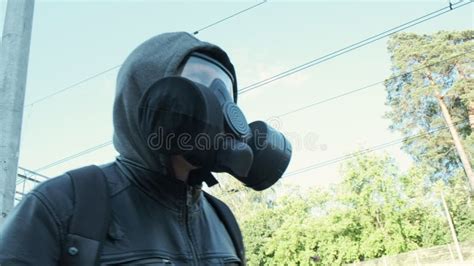 Man In Gas Mask At Epidemic Standing Outdoors Chemical Weapon Virus