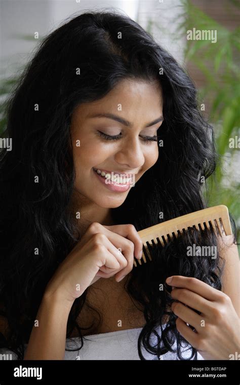 Indian Young Woman Combing Long Hi Res Stock Photography And Images Alamy
