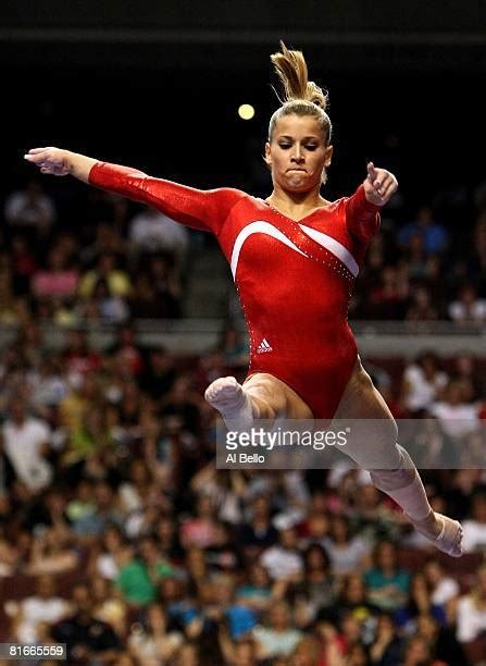gymnast high beam photos and premium high res pictures getty images