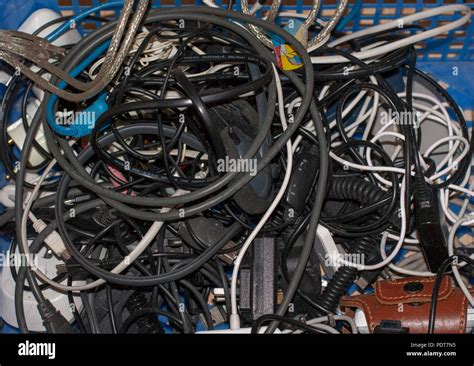 Tangled Mess Of Wires Adaptors And Cables Stock Photo Alamy