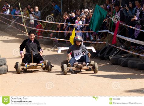 The wooden cart racing. editorial stock image. Image of people - 28723329
