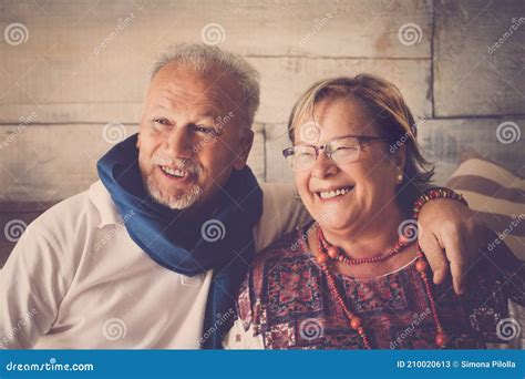 Happy Old Mature Couple Have Fun At Home In Smiling Portrait Elderly