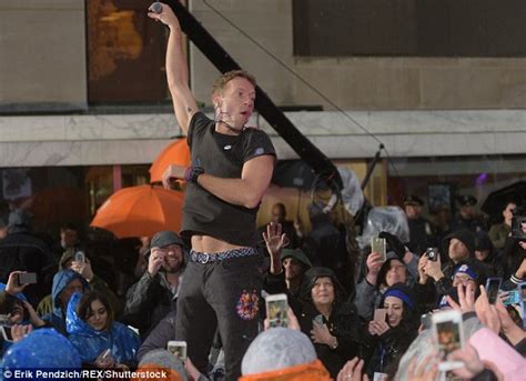 Chris Martin Flashes Sculpted Stomach During Coldplay Performance In