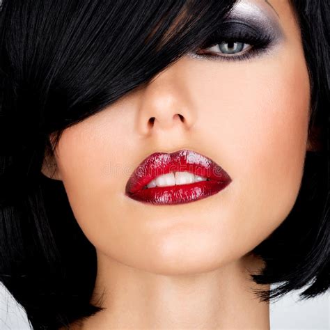 Beautiful Brunette Woman With Shot Hairstyle And Red Lips Stock Image