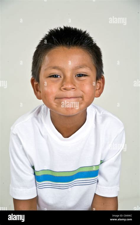 6 7 Year Old Hispanic Boy Making Silly Face Mischievous Mr © Myrleen