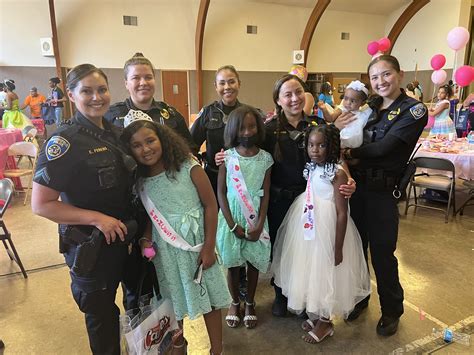 Bakersfield Police Department Officers Celebrate With Local Princesses