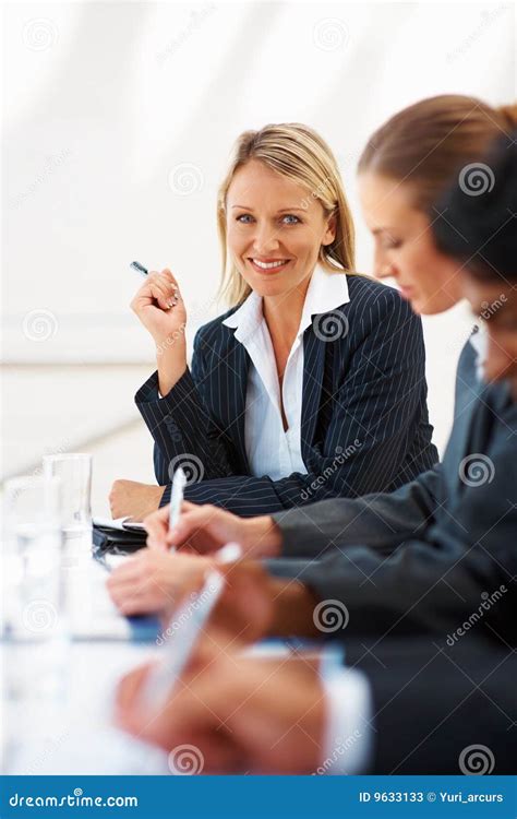 Gorgeous Business Woman Smiling At A Conference Stock Image Image Of