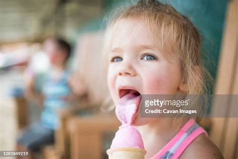girls licking ice cream photos and premium high res pictures getty images