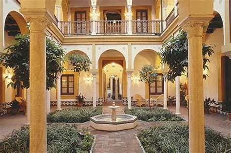 Hotel casa imperial features original, brightly coloured tiles, charming stone archways, fountains and peaceful galleries. HOTEL CASA IMPERIAL SEVILLE Apartments and Hotels in Seville