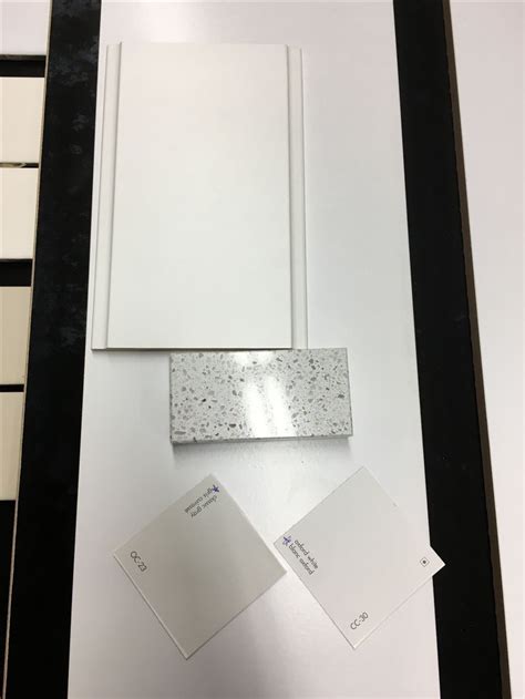 Cabinet & countertop store, construction service & supply. Large tile under samples: tile "trim" for around bathtubs ...