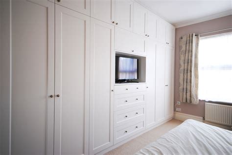15 Photos Built In Wardrobes With Tv Space Wardrobe Ideas