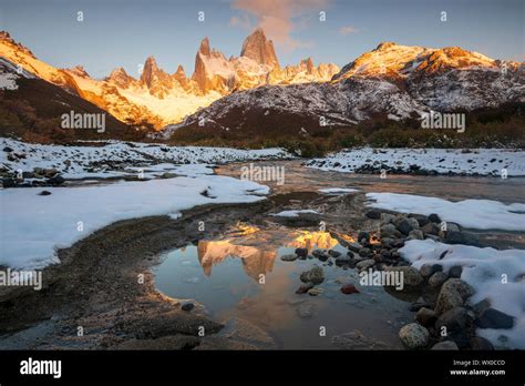 Reflections Of Mount Fitz Roy And Cerro Torre In Autumn With Covering