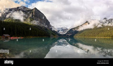 Early Morning Reflections On Lake Louise Stock Photo Alamy