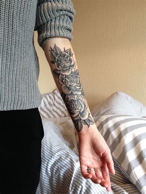 multiple roses inked on forearm tattoos skull girl tattoos hand tattoos sleeve tattoos new