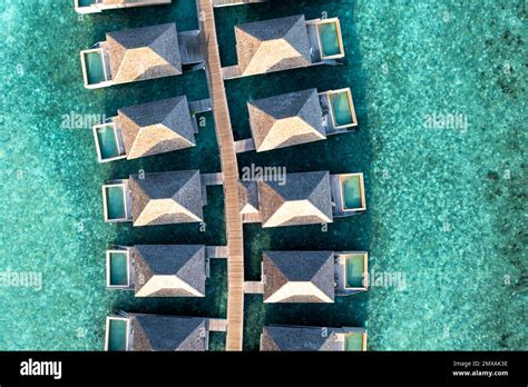 Aerial View Hurawalhi Island Resort With Beaches And Water Bungalows