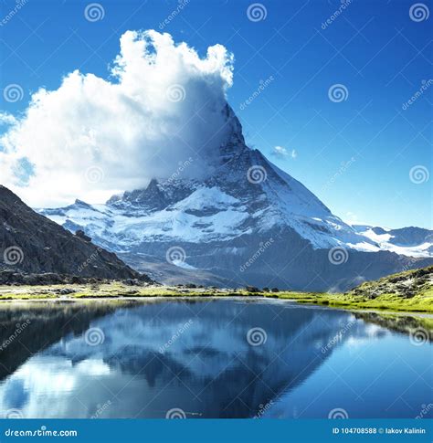 Reflection Of Matterhorn In Lake Riffelsee Stock Photo Image Of Cloud
