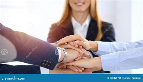 Business Team Showing Unity With Their Hands Together Group Of People