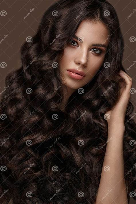 Beautiful Brunette Model Curls Classic Makeup And Full Lips The Beauty Face Stock Image