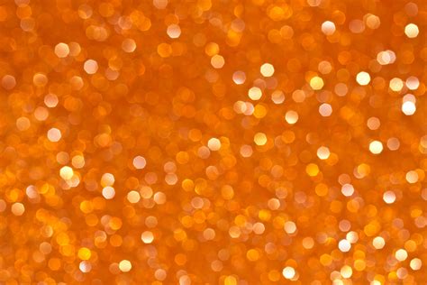 Download Shiny Orange Bokeh Wallpaper