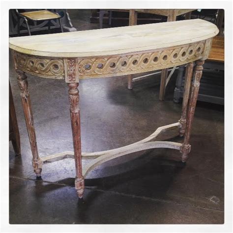 The traditionally designed half round console table is a multipurpose accent table. Half Round Console - Nadeau Dallas