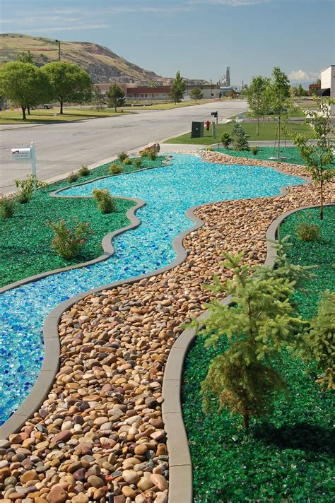 Glass Nuggets And Glass Rocks In Lieu Of Bark Mulch Glass Can Provide Rock Garden Landscaping