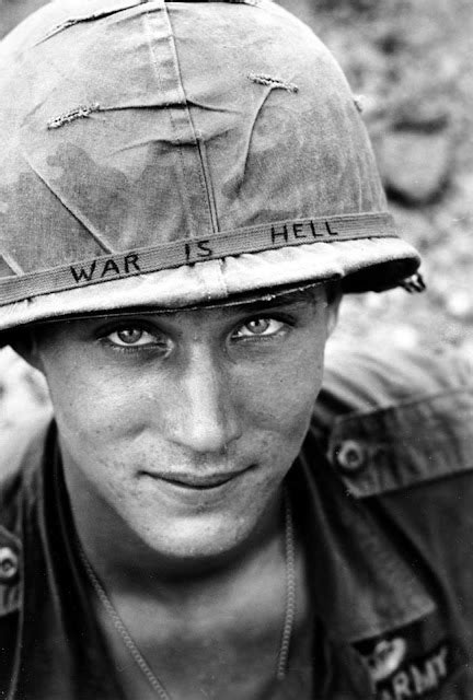 The Story Behind The Iconic Photo Of A Soldier Wearing A Hand Lettered