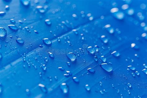 Rain Water Droplets On Blue Waterproof Stock Image Image Of Outdoor